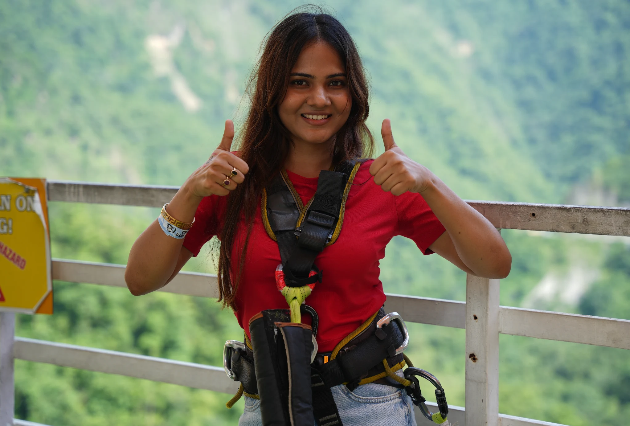 Thrilled Jumper Posing on 111m Launch Bridge with Canyon Views