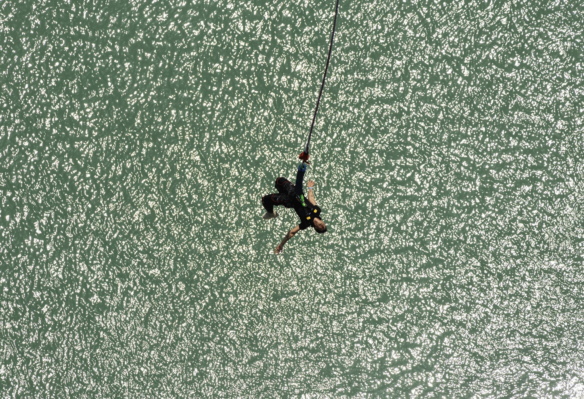 Bird-Eye Freefall Plunge over Emerald Blue Water