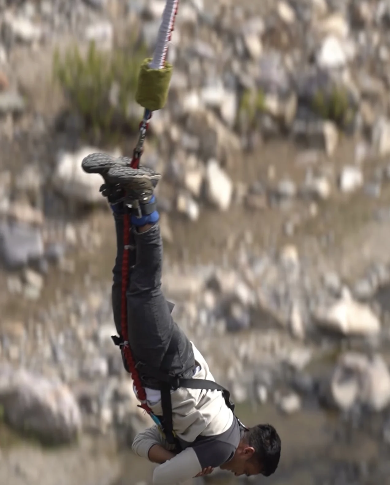High-Altitude Elastic Freefall over Riverbed
