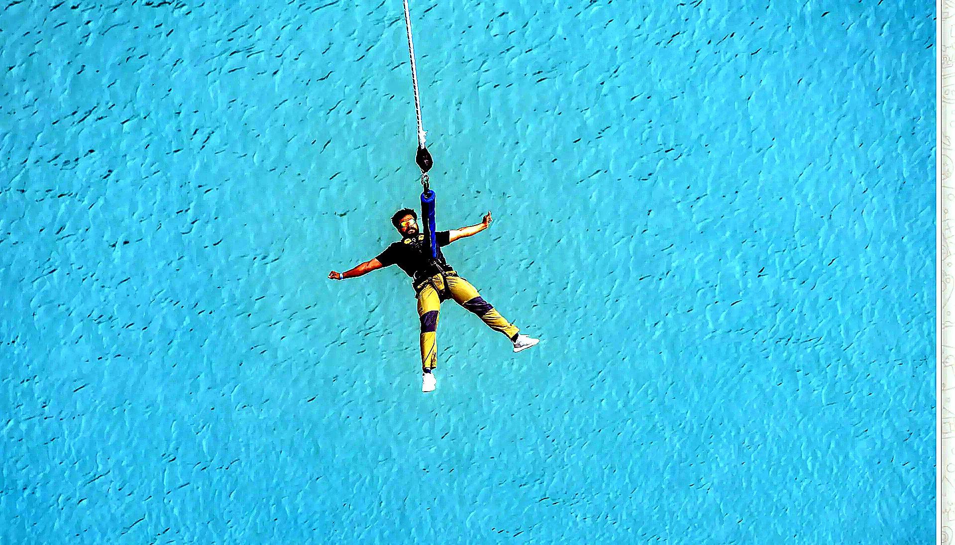 Bird-Eye Freefall Plunge over Emerald Blue Water