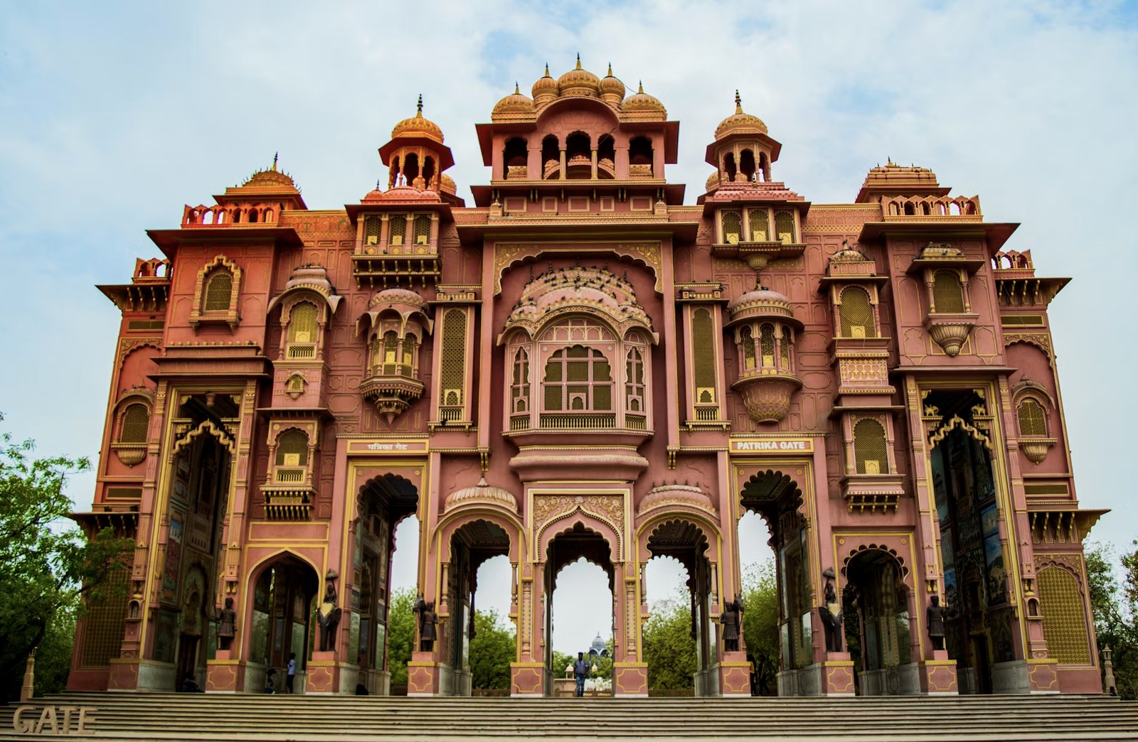 Vibrantly painted heritage arches and Rajasthani artwork at Patrika Gate