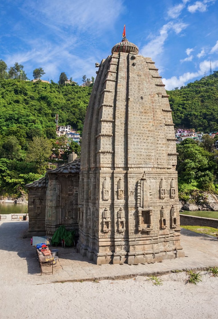 Ancient Nagara-style stone temple in the serene Himalayan valley