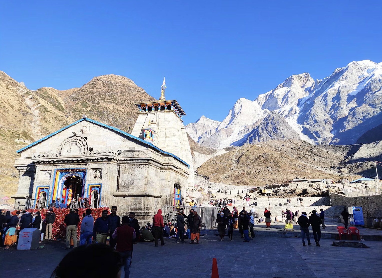 Colorful facade of Badrinath Temple beneath Neelkanth mountain peaks