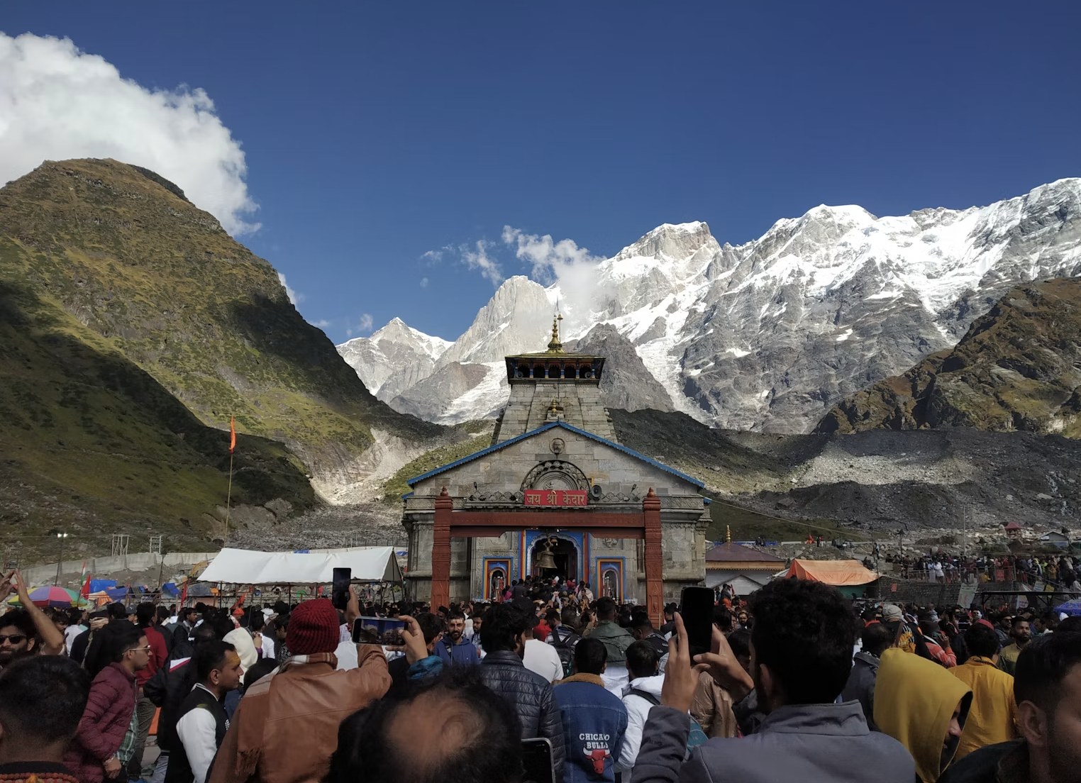 Pilgrims approaching the sacred Kedarnath shrine in the Mandakini valley
