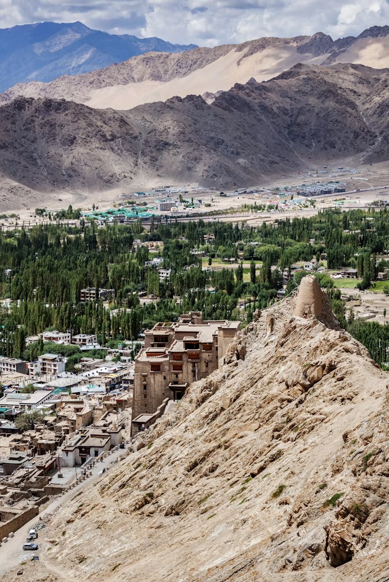 Historical Leh Palace perched atop Tsemo Hill overlooking Leh town and green oasis