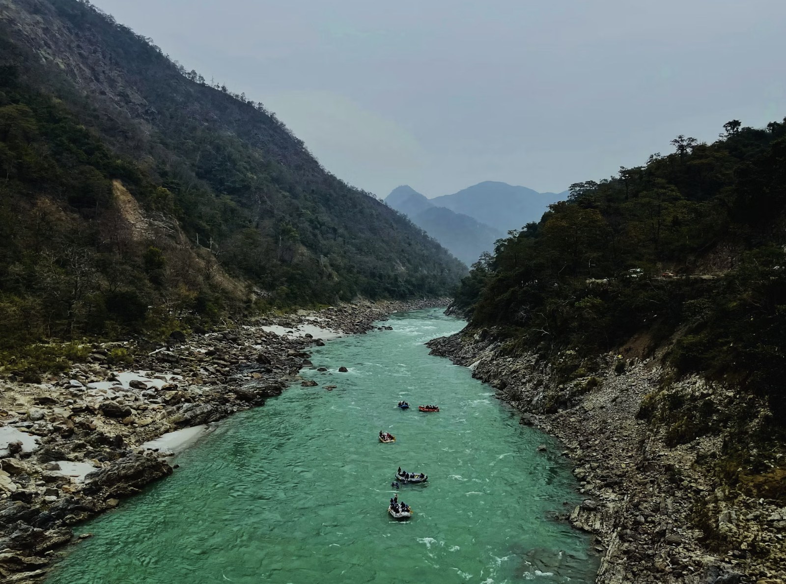Sweeping turquoise Himalayan river canyon of the Ganges in Rishikesh