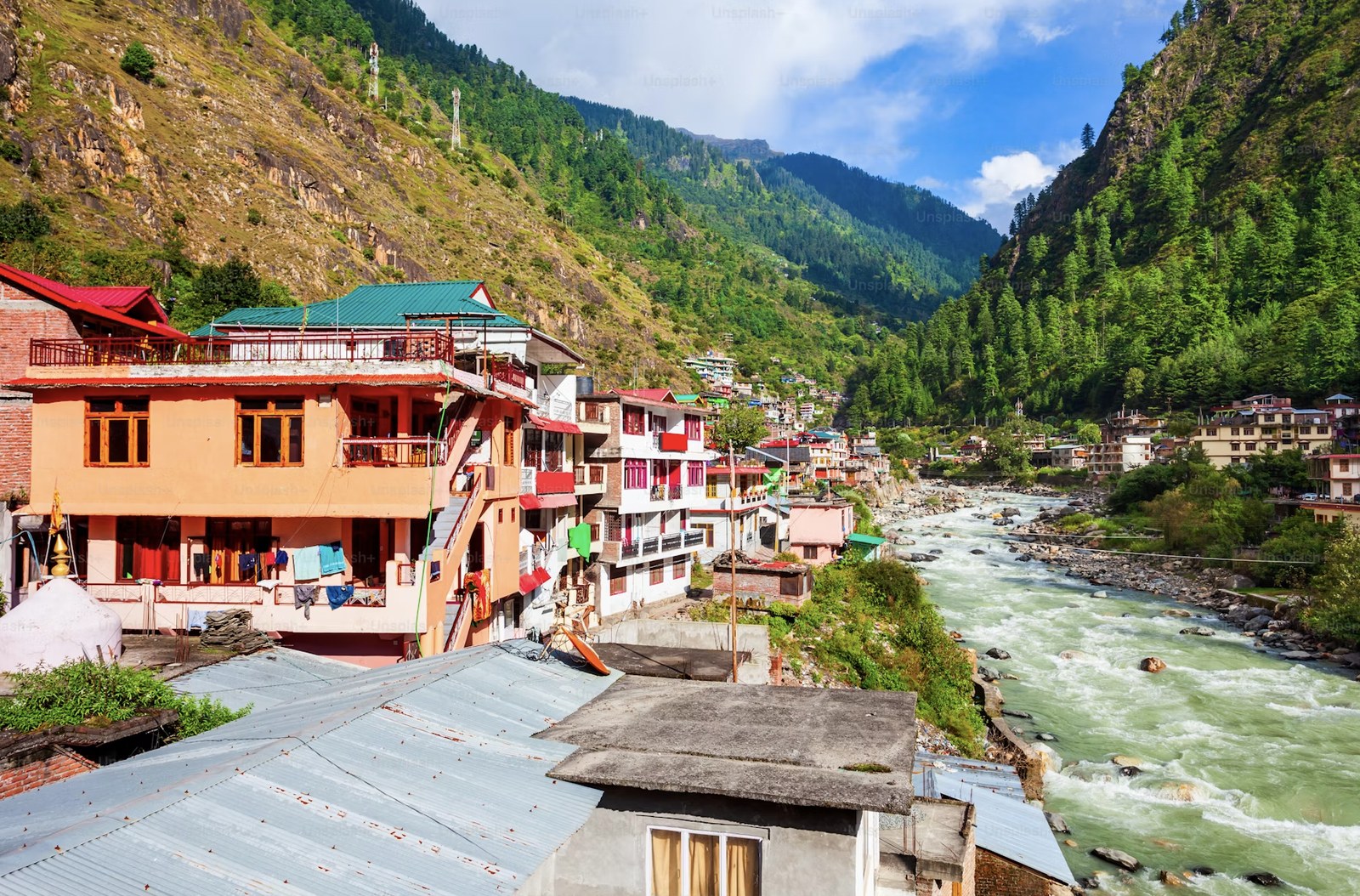 Charming riverside settlement and lush alpine hills