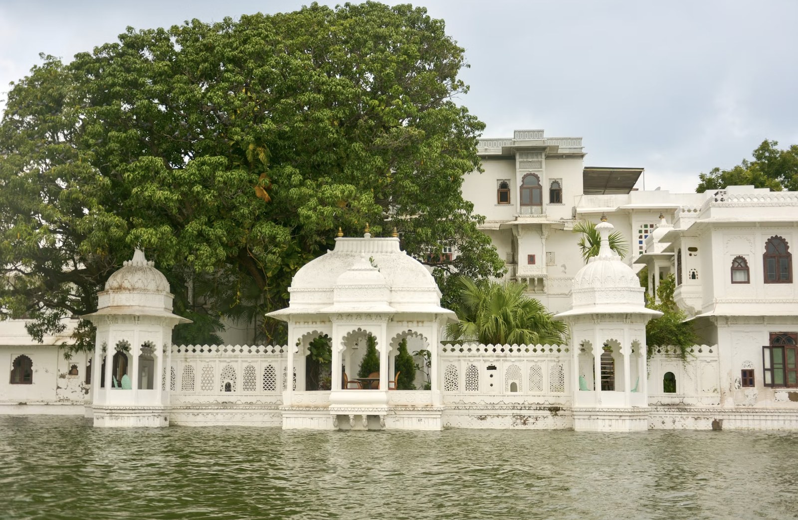 Jag Mandir Island Palace with scenic marble arches and lush waterfront gardens
