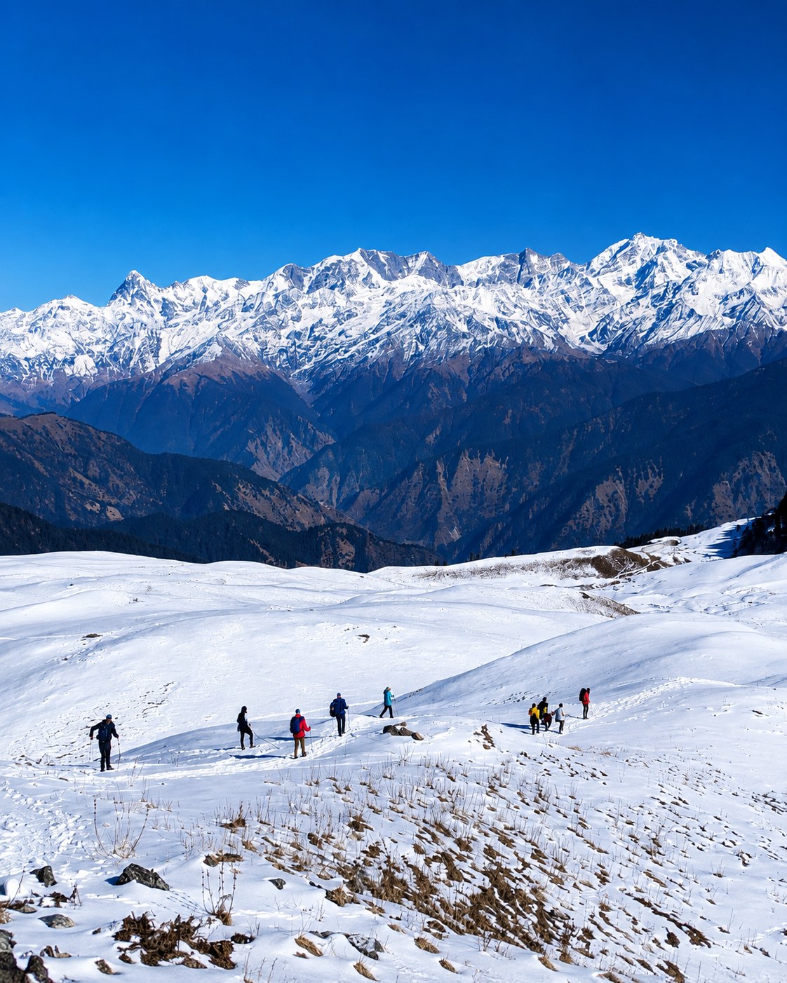 Majestic snow-capped Himalayan peaks under deep blue skies
