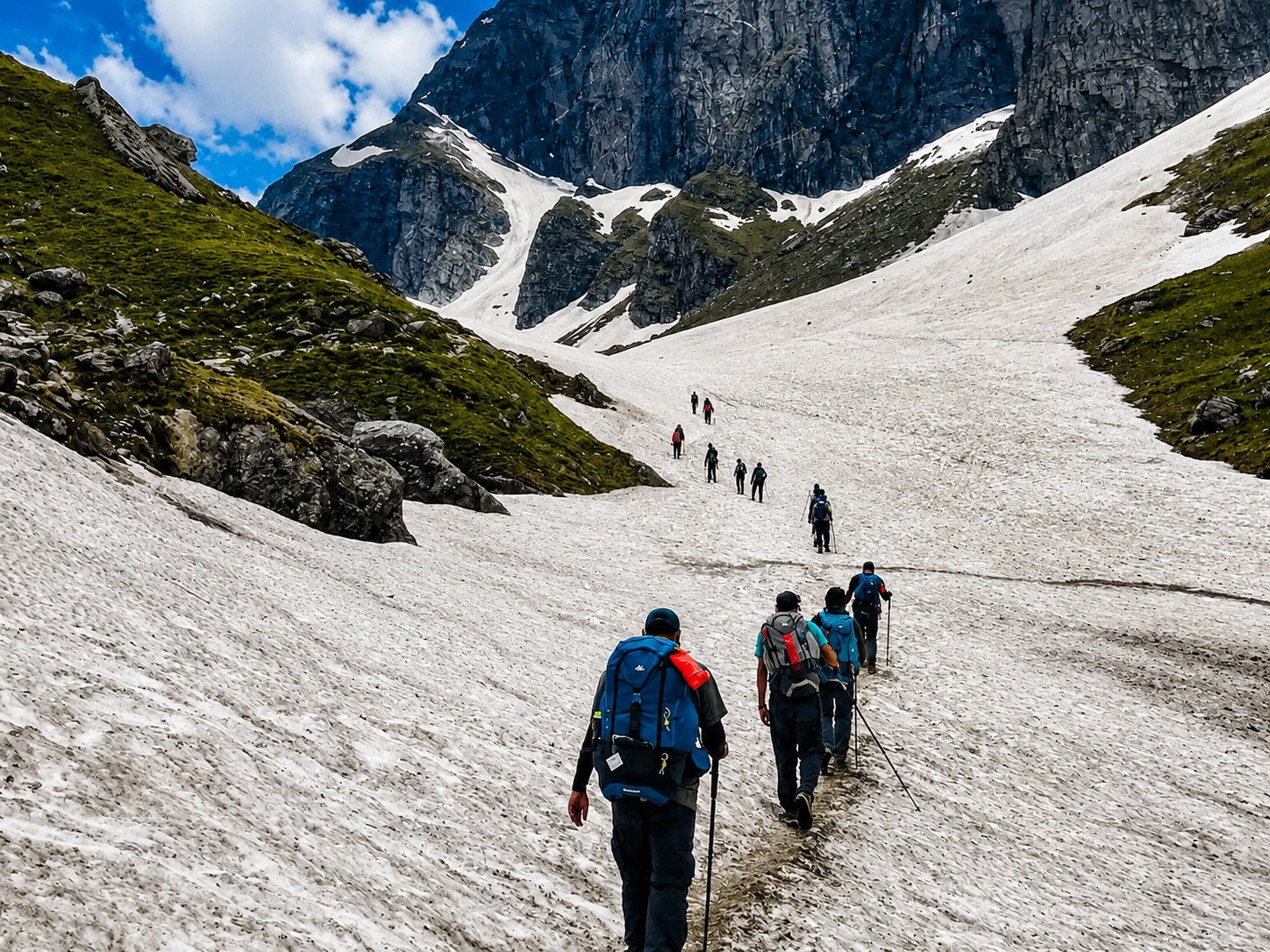Ascending through snow fields towards Hampta Pass summit