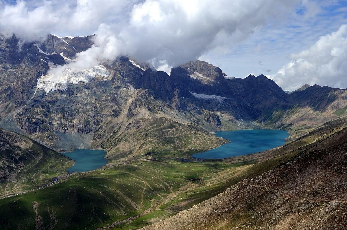 High-altitude glacial twin lakes nestled under rocky ridges