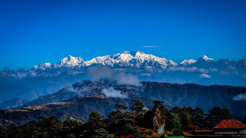 Dramatic cloud bed and Himalayan peaks view from high ridge